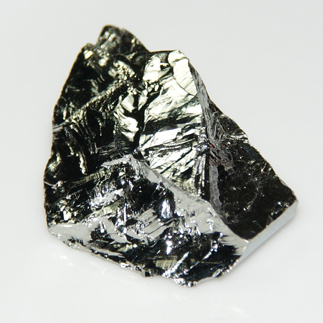 Exploring the Enigmatic Mineral: Magnetite - A Metallic Luster, Black Streak, and Iron Ore